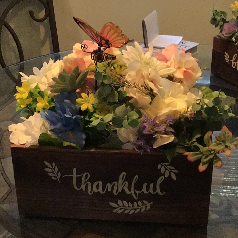 5 1/2” x 13” box Filled with flowers